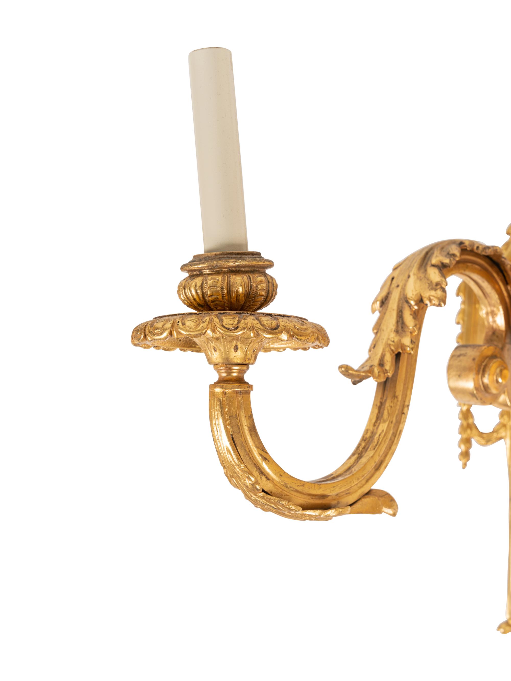 A Pair of Louis XVI Style Gilt Bronze Two-Light Sconces