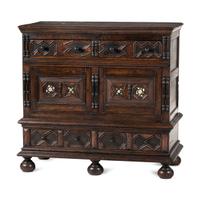 A Flemish Paneled and Molded Oak Chest of Drawers