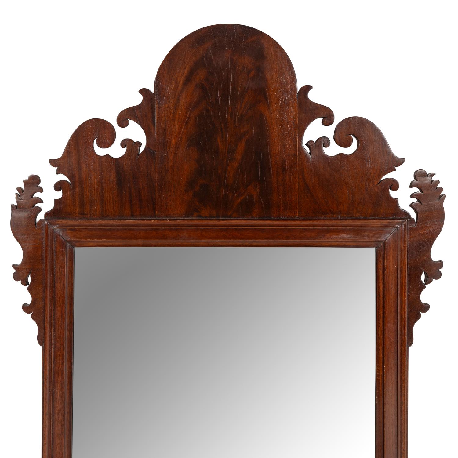 A Chippendale Carved and Figured Mahogany Looking Glass