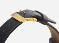 A Men's 18K Yellow Gold Corum Quadratus Watch