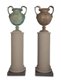 A Pair of Neoclassical Patinated Cast Metal Urns on Gray-Painted Wood Pedestals