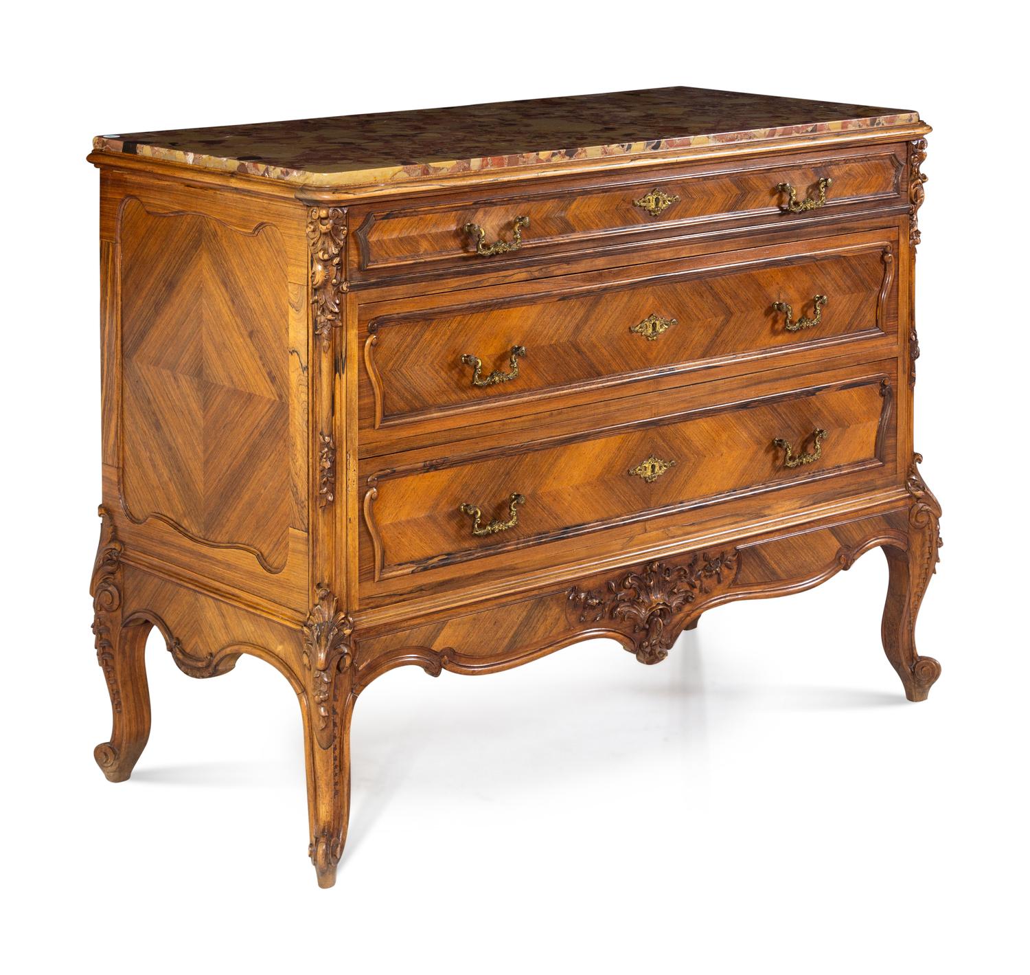 A Louis XV Style Walnut Commode