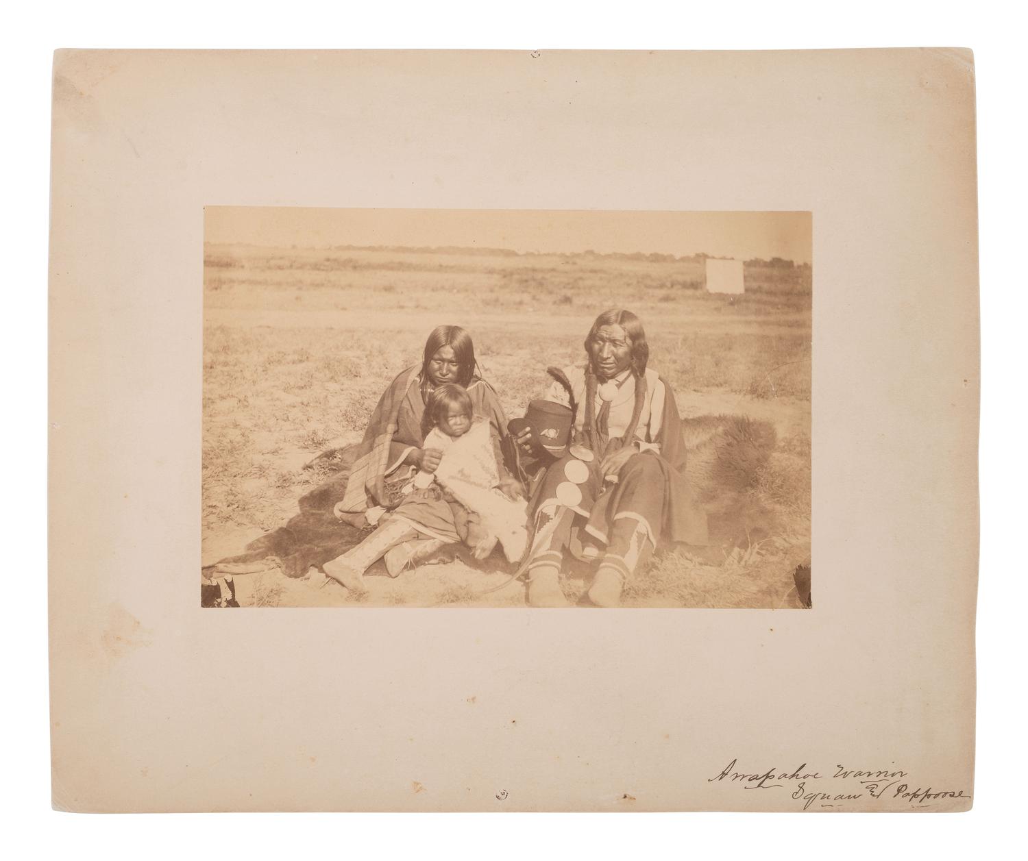 [SOULE, William S. (1836-1908), photographer]. Photograph of Arapahoe warrior, wife, and papoose. Ca 1868-early 1870s.