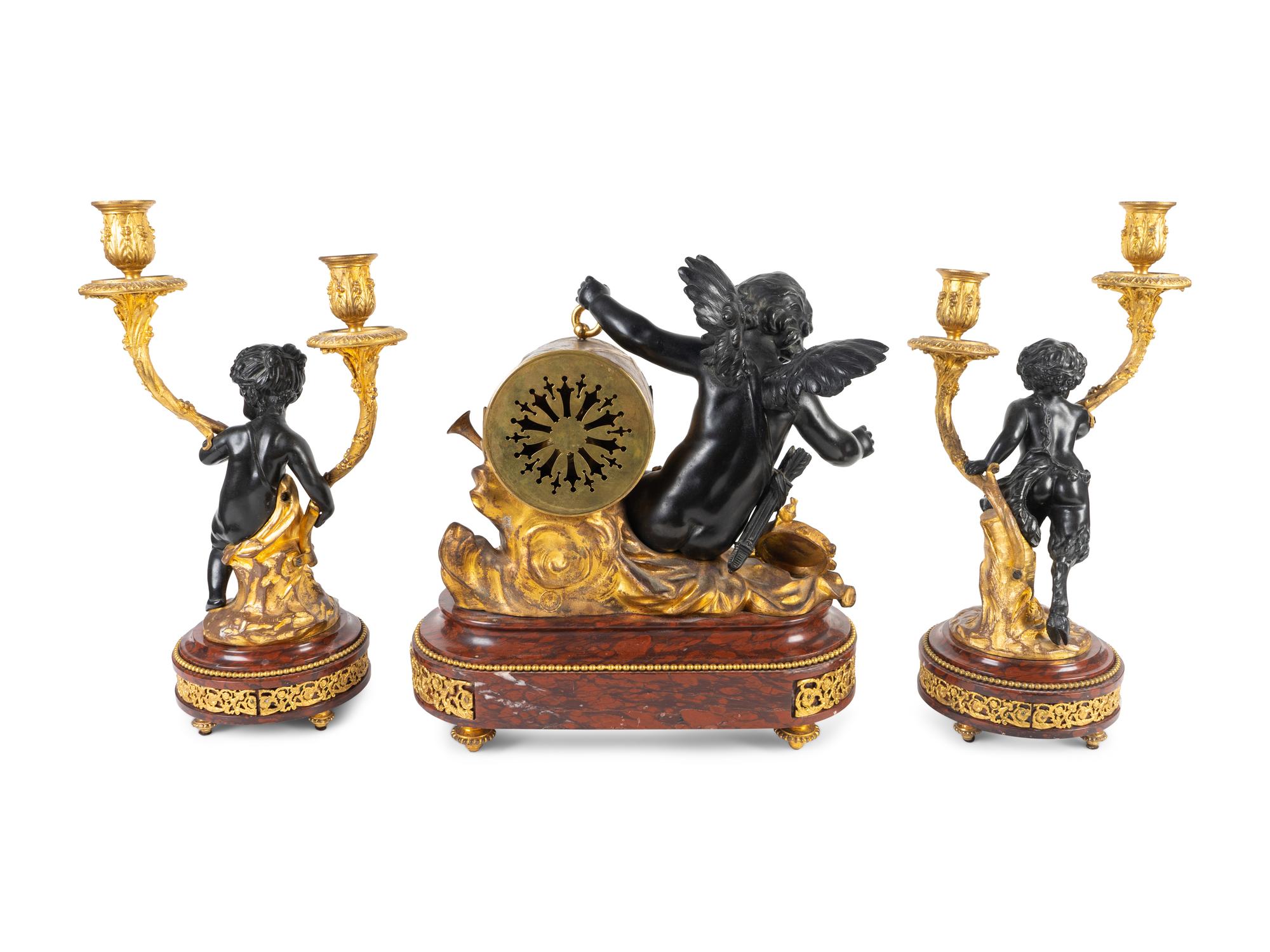 A Napoleon III Style Gilt Bronze Mounted Rouge Marble Clock Garniture — 19TH CENTURY