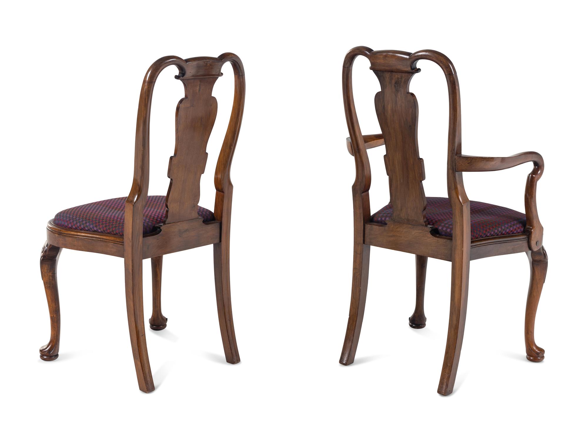 A Set of Eight George I Style Walnut Dining Chairs