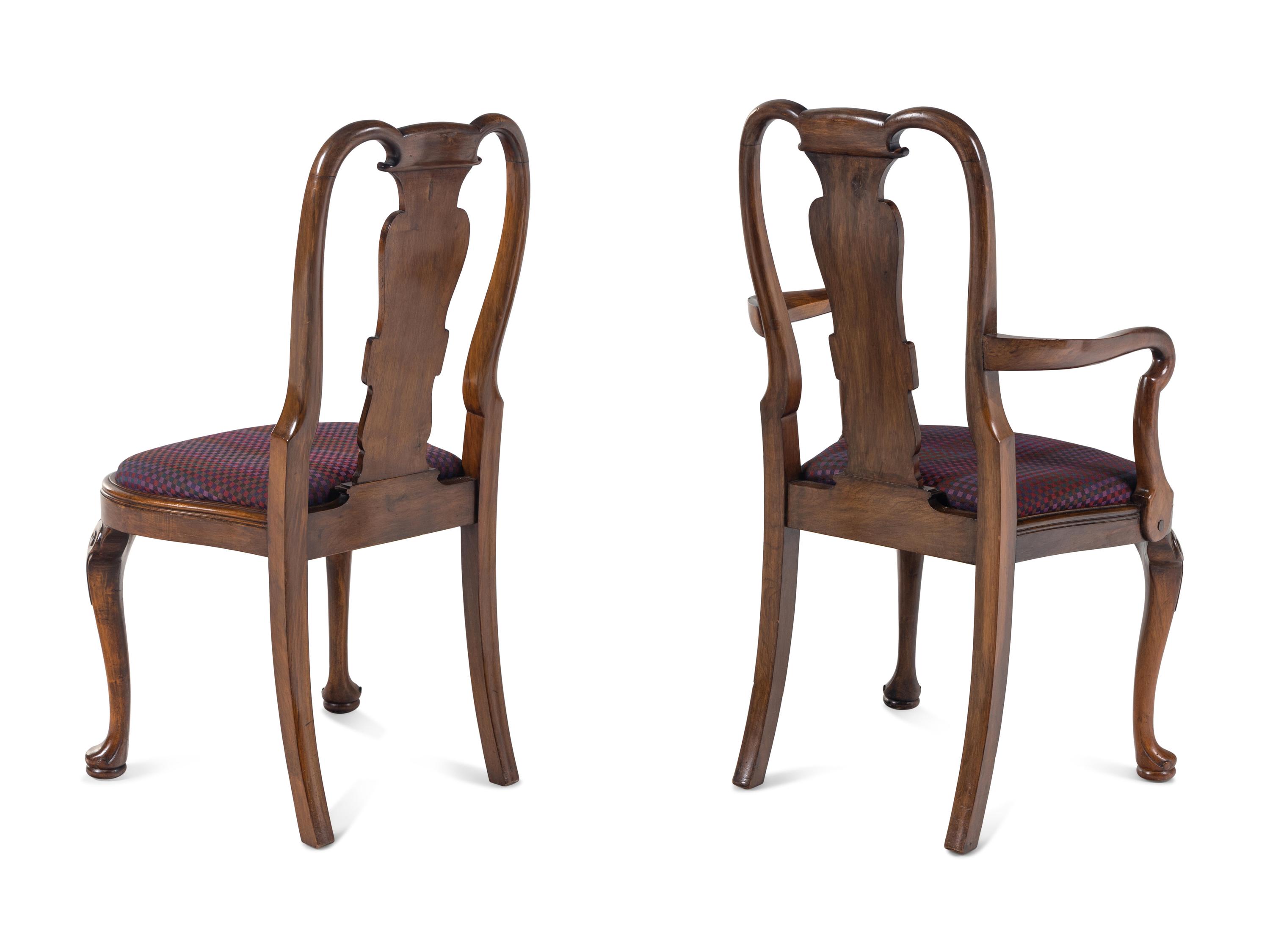 A Set of Eight George I Style Walnut Dining Chairs