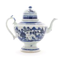 A Large Canton Porcelain Blue and White Teapot Height 8 7/8 inches. — 19TH CENTURY