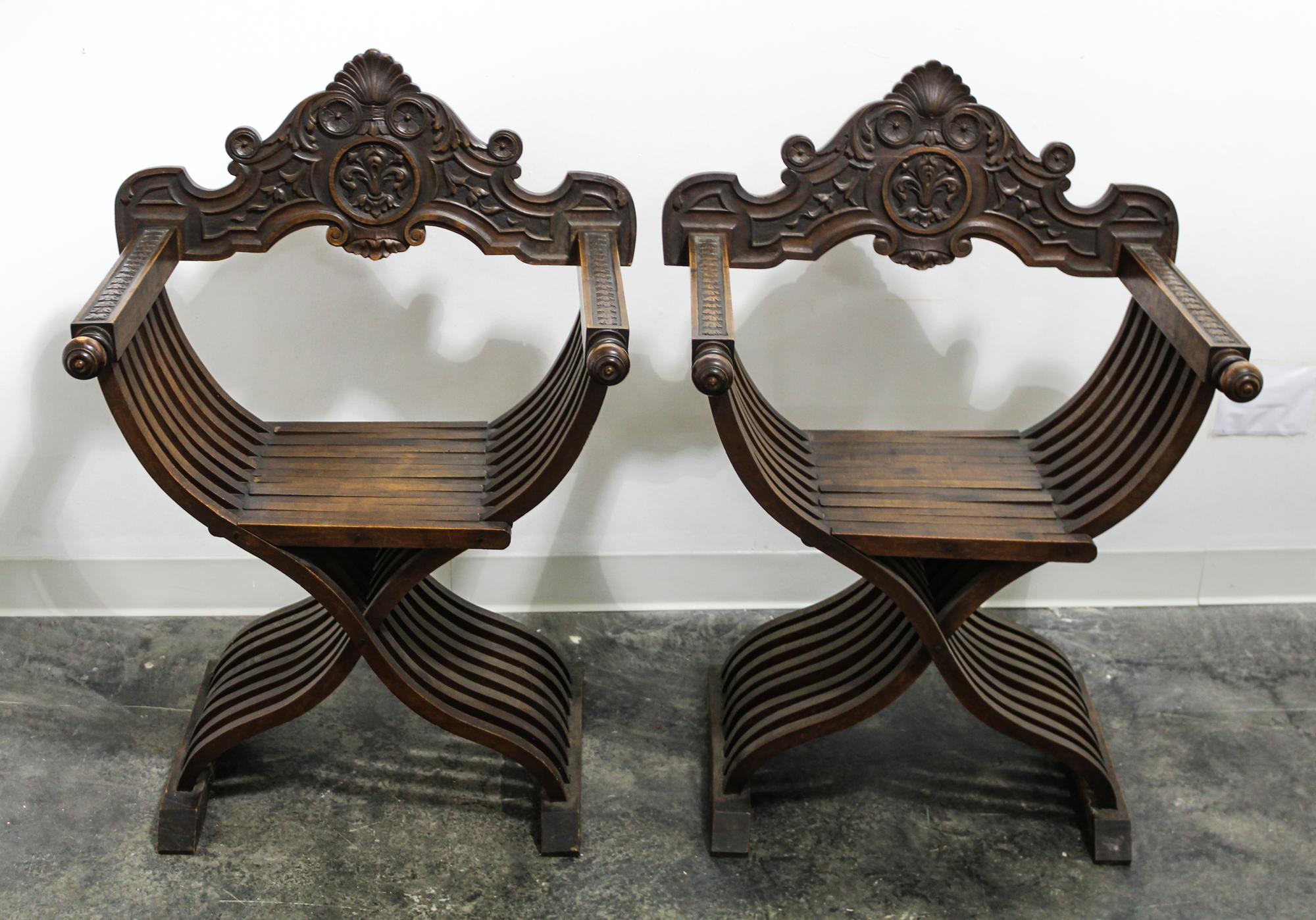 A Pair of Renaissance Revival Chairs. Height 37 inches.