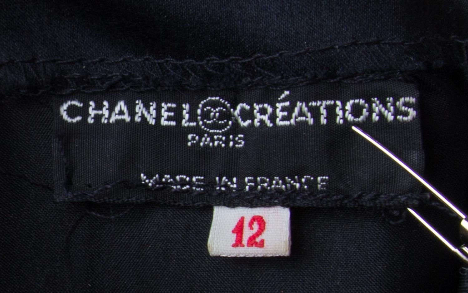A Chanel Creations Black Silk Pleated Dress, Size 12.