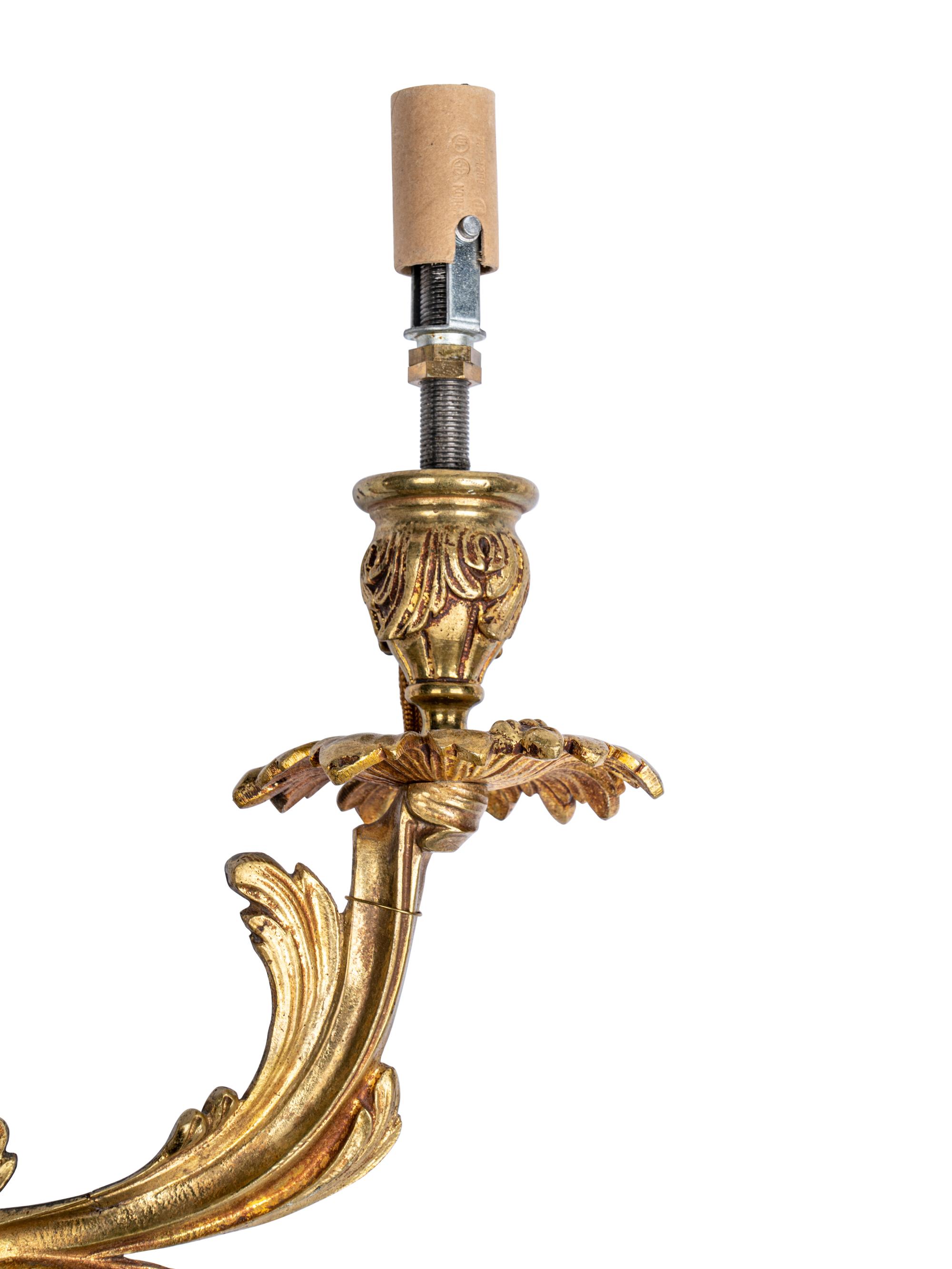 A Pair of Louis XV Style Gilt Bronze Two-Light Sconces