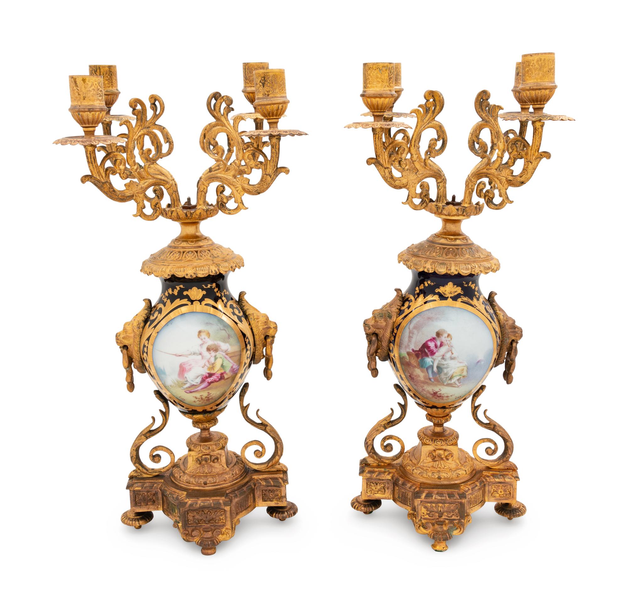A Pair of Gilt Metal Mounted Sèvres Style Four-Light Candelabra