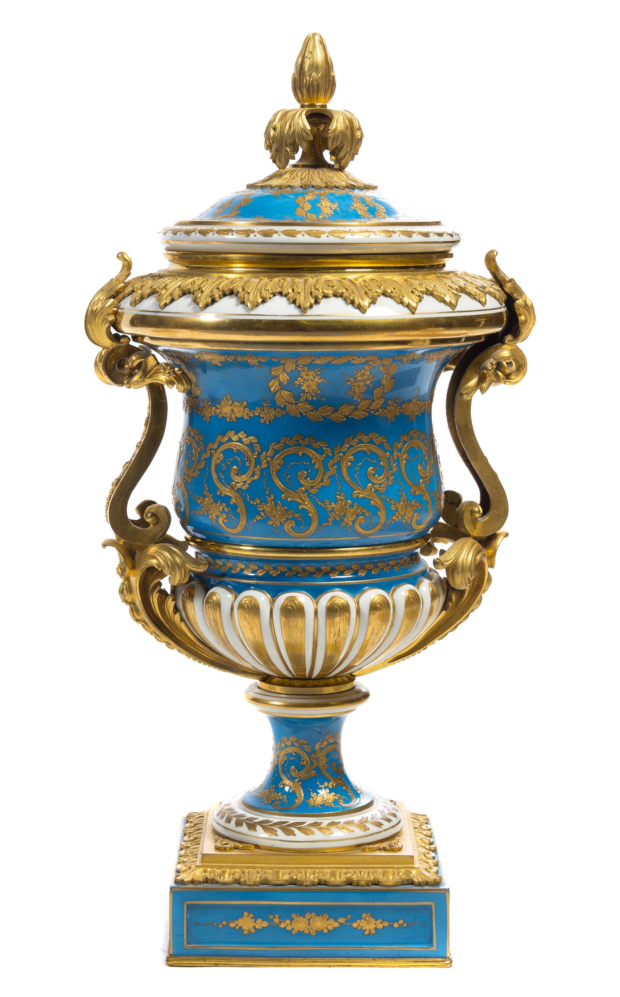 A Gilt Bronze Mounted Sevres Porcelain Urn and Cover Height 25 inches.