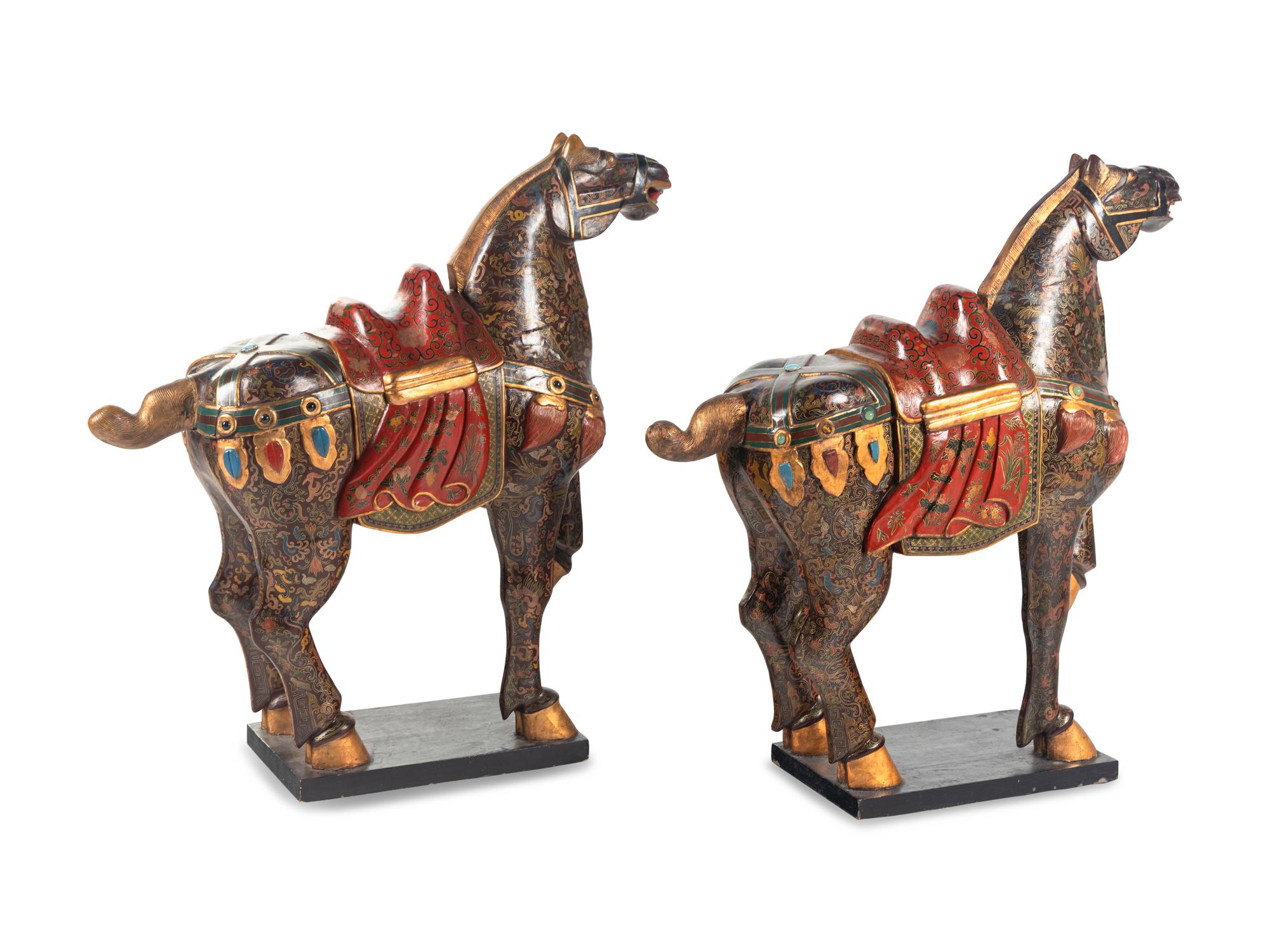 A Pair of Chinese Painted and Parcel Gilt Horses