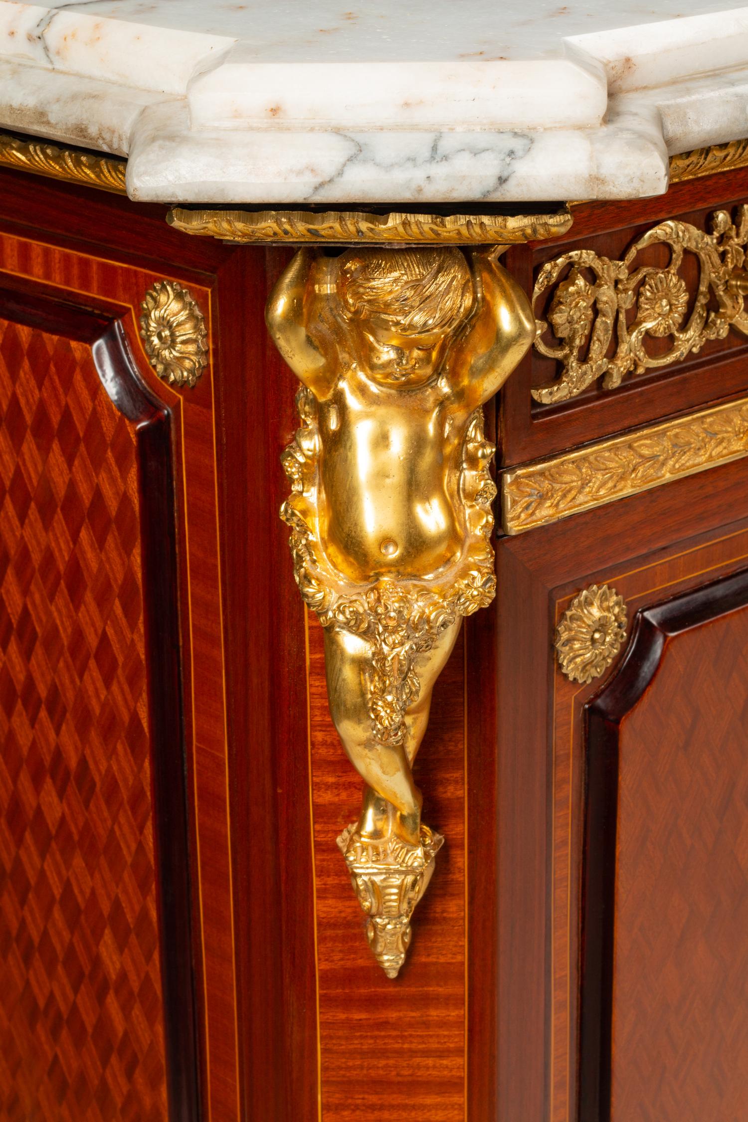 A Pair of Louis XVI Style Gilt Bronze and Porcelain Mounted Marble-Top Cabinets