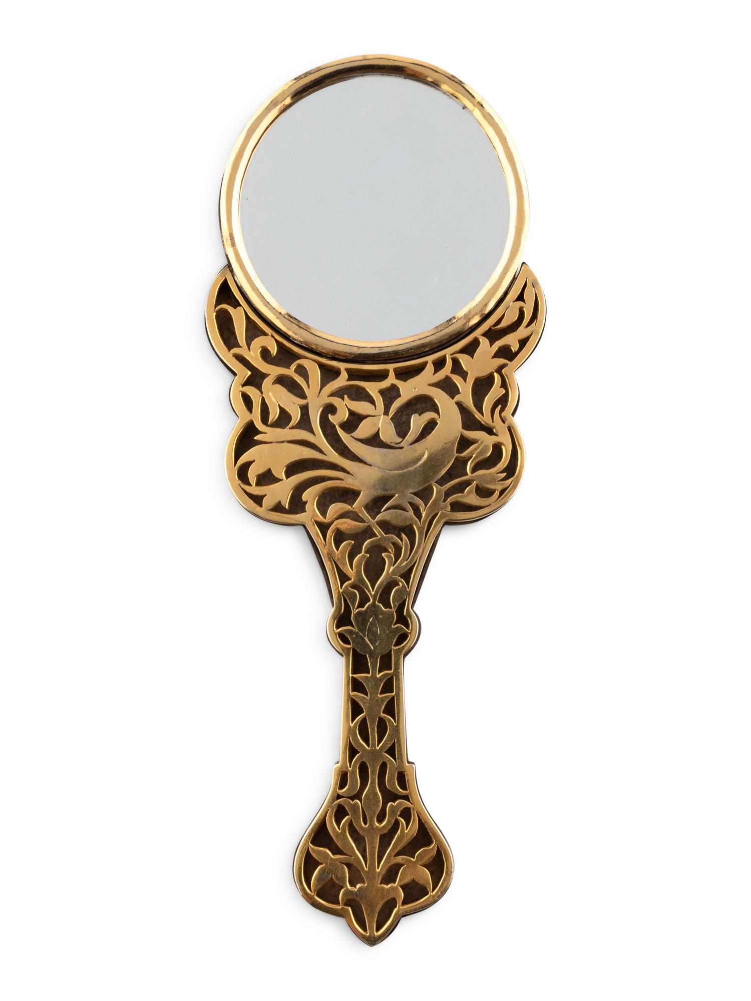 An East Indian Silver and Enamel Hand Mirror