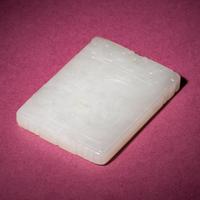 A Chinese Carved and Inscribed White Jade Rectangular Plaque, 18th/19th Century — 清中期 白玉詩文络丝圖子岡牌