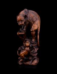 A Japanese Carved Wood Okimono