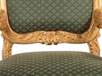 A Pair of Rococo Style Giltwood Fauteuils