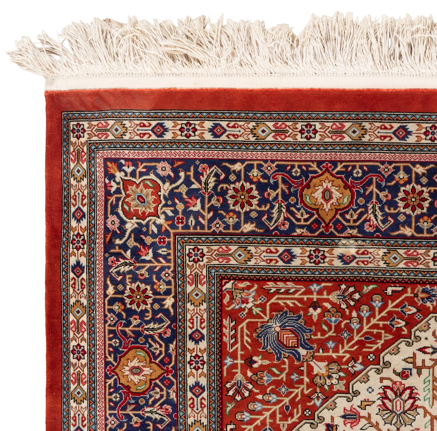 A Signed Silk Rug