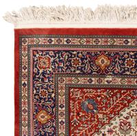 A Signed Silk Rug