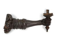 A Pair of Italian Carved, Painted and Parcel Gilt Arm-form Wall Sconces