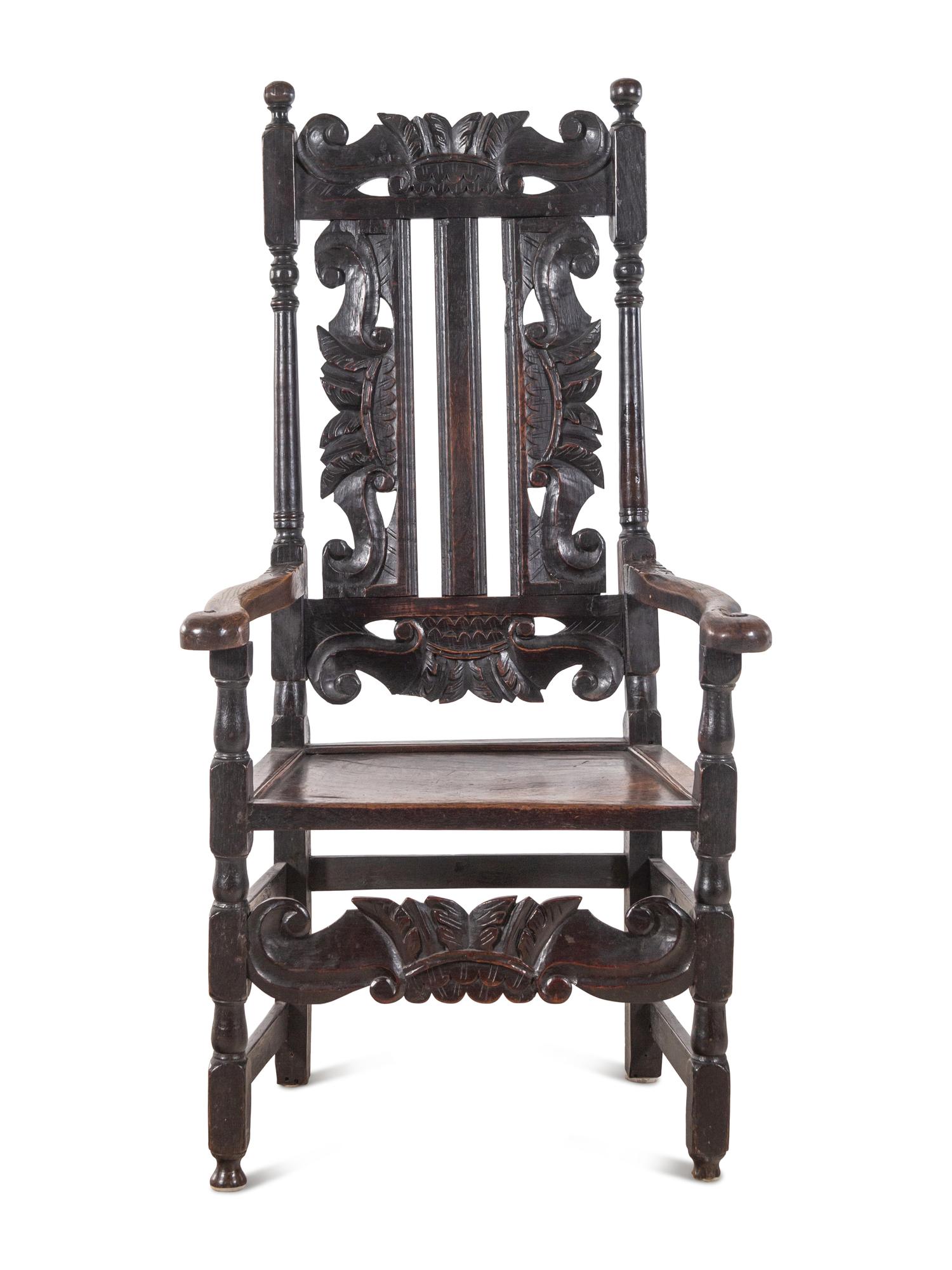 A William and Mary Carved Oak Armchair