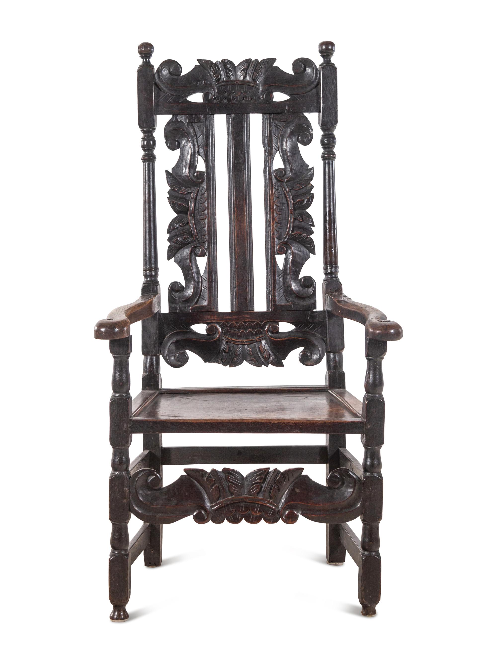 A William and Mary Carved Oak Armchair
