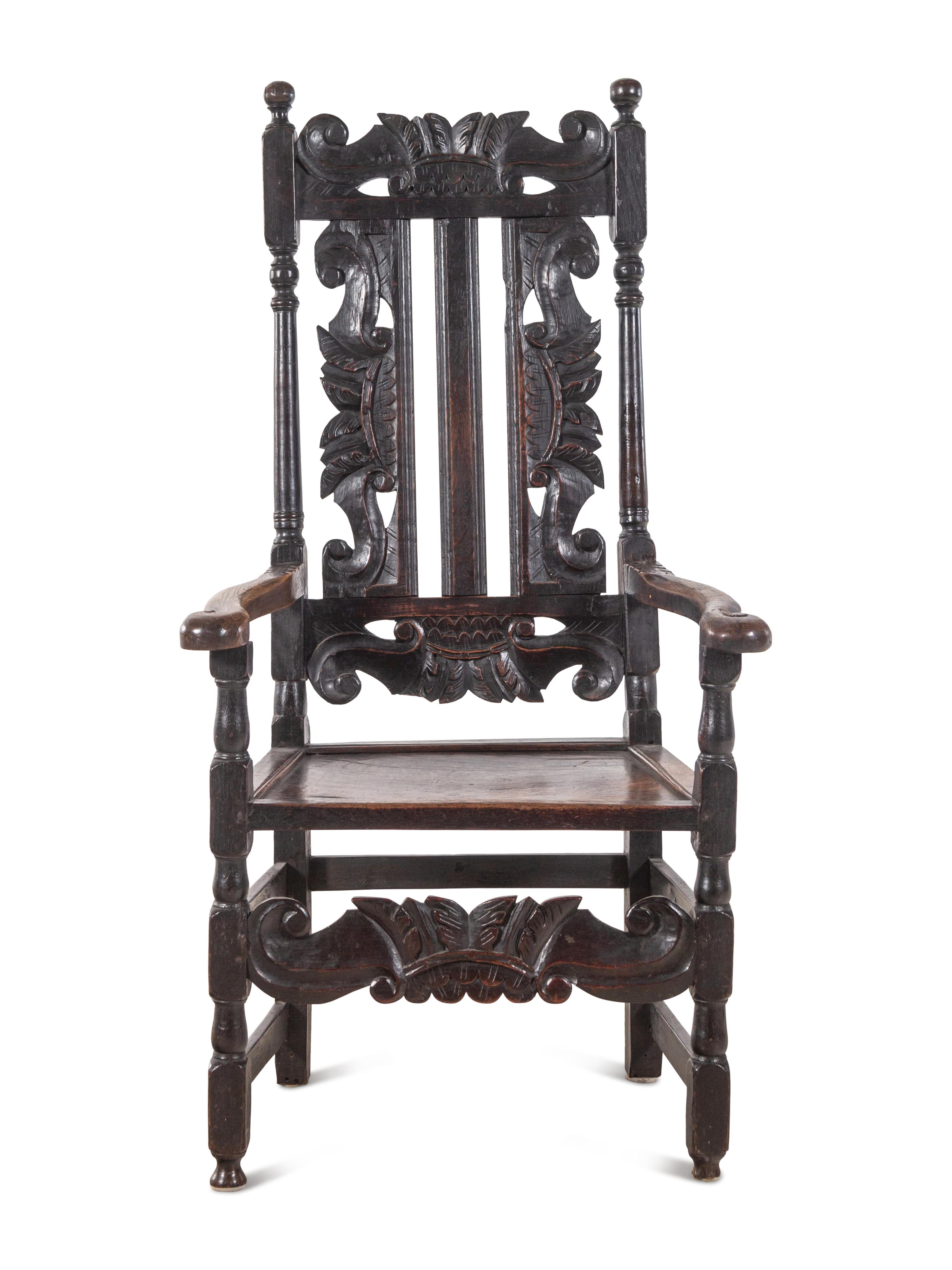 A William and Mary Carved Oak Armchair