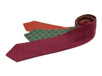 Three Hermes ties, one green, one red, one gray with red pattern