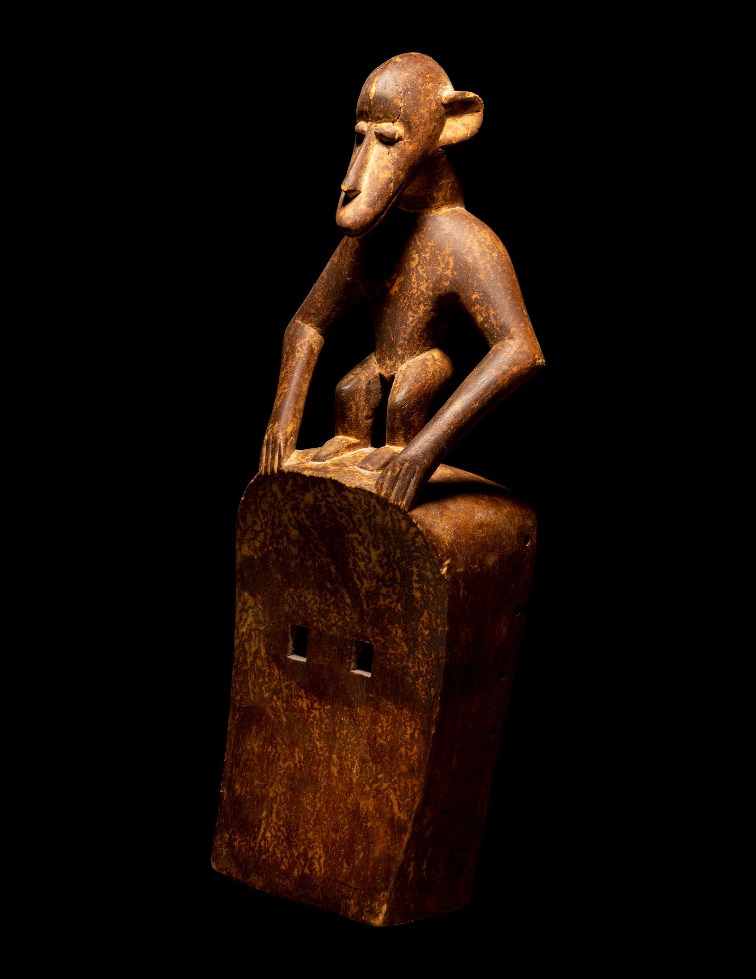 Two Dogon Wood Masks with Figures