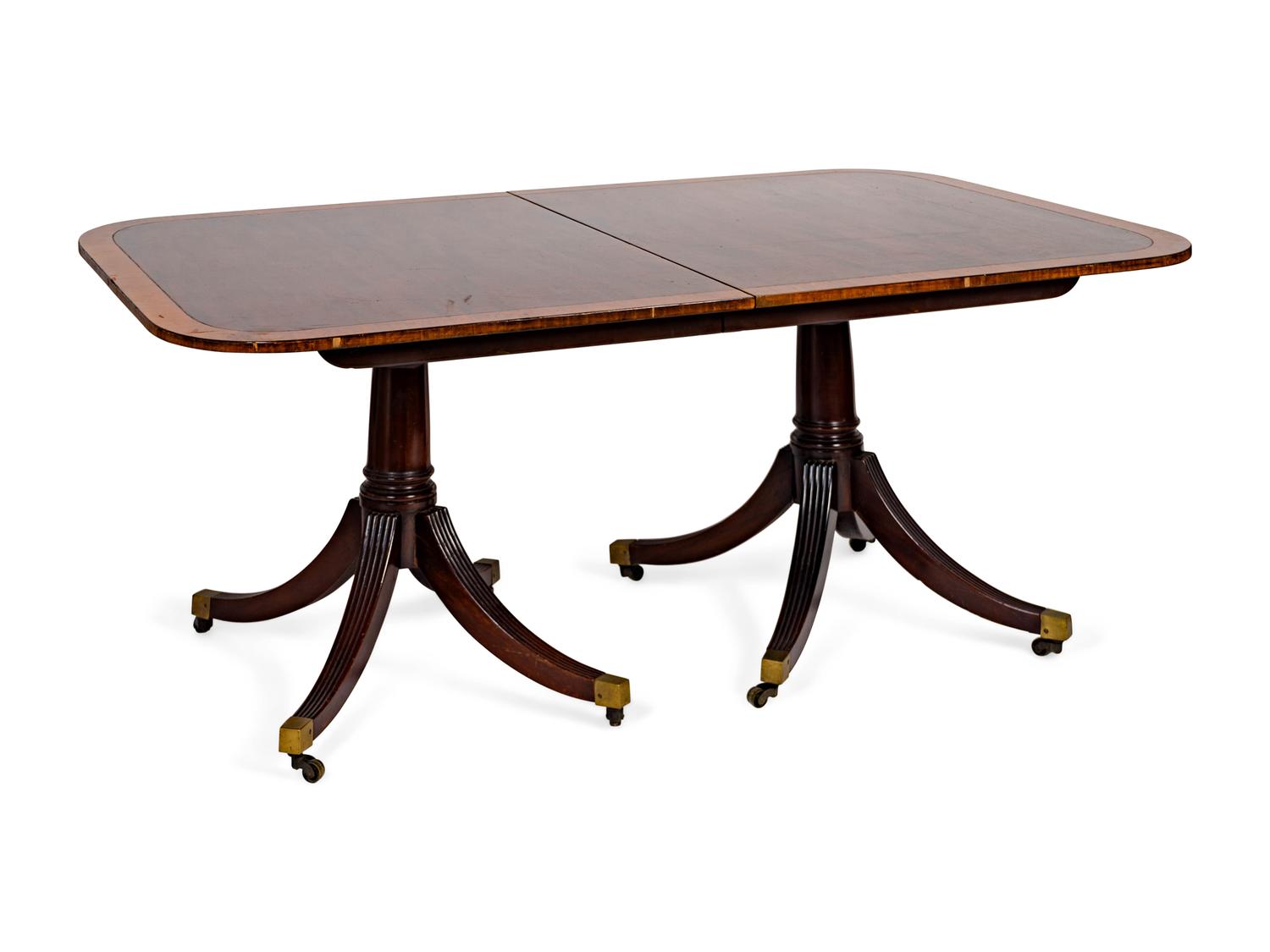 A George II Style Crossbanded Mahogany Two-Pedestal Table — 20TH CENTURY