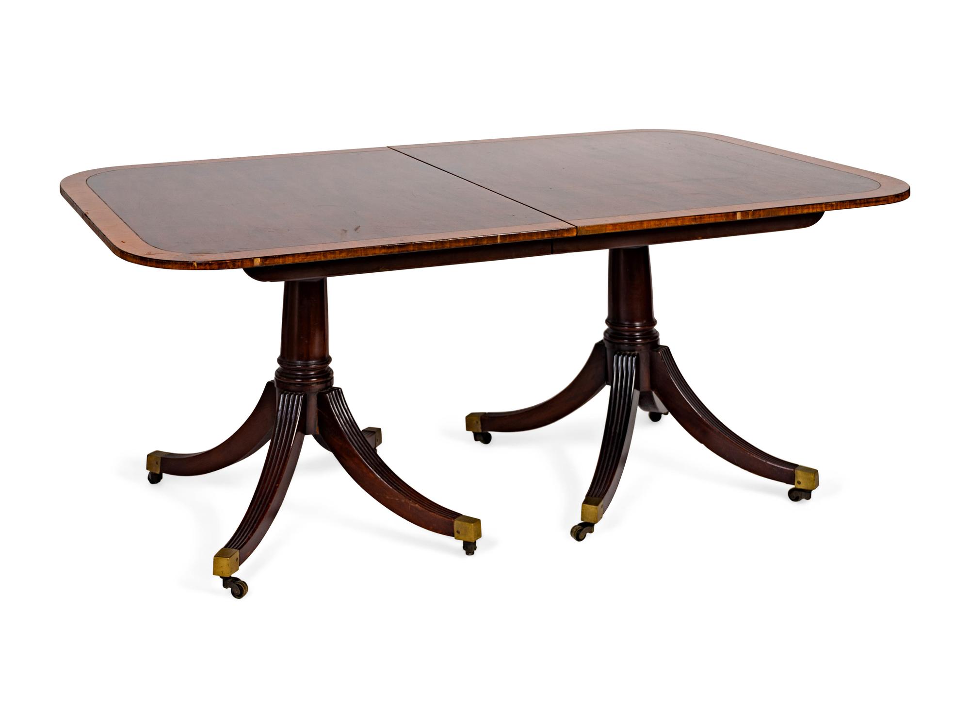 A George II Style Crossbanded Mahogany Two-Pedestal Table — 20TH CENTURY