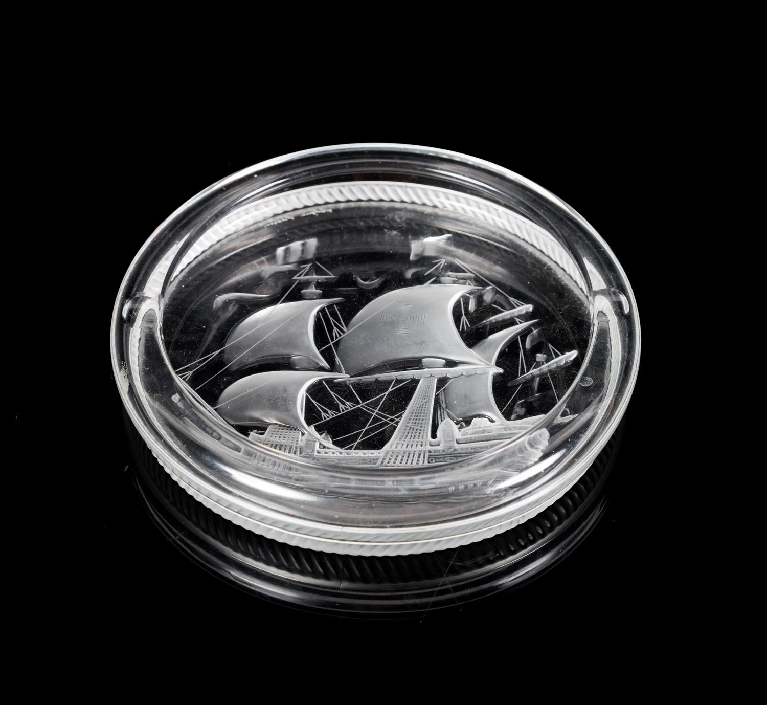 Lalique, a molded and frosted glass ash receiver, decorated with a ship