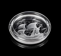 Lalique, a molded and frosted glass ash receiver, decorated with a ship