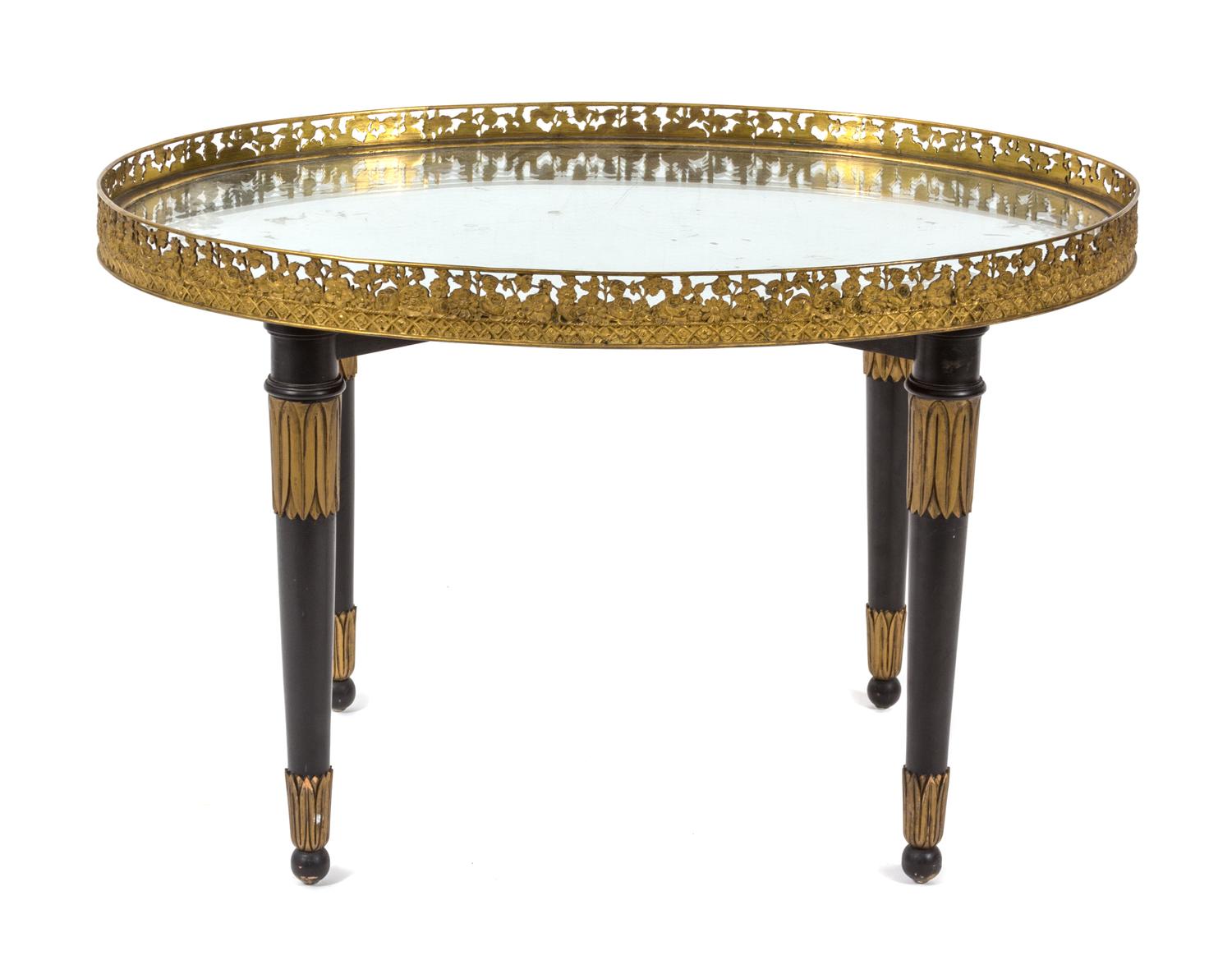 A Neoclassical Style Ebonized Oval Tray Top Table Height 19 1/2 x width 30 1/2 x depth 21 3/4 inches. — 19TH CENTURY