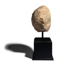 A Roman Marble Head of a Man Wearing a Phyrigian Cap