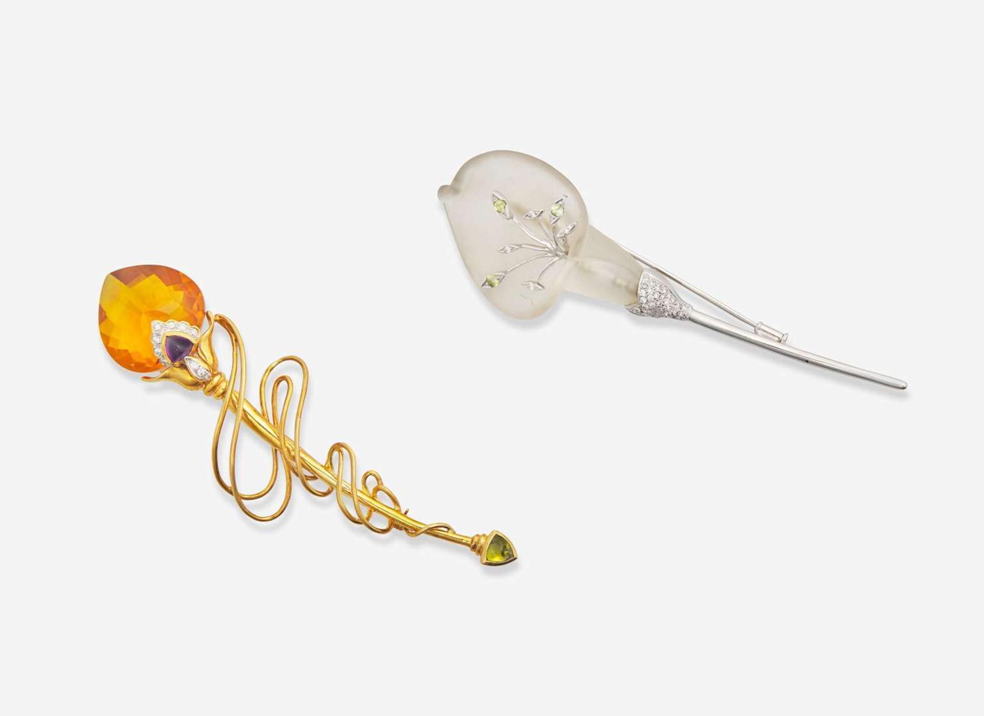 A Pair of Gold and Gemstone Lapel Pins