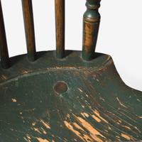 An assembled group of four bow-back Windsor chairs; circa 1800