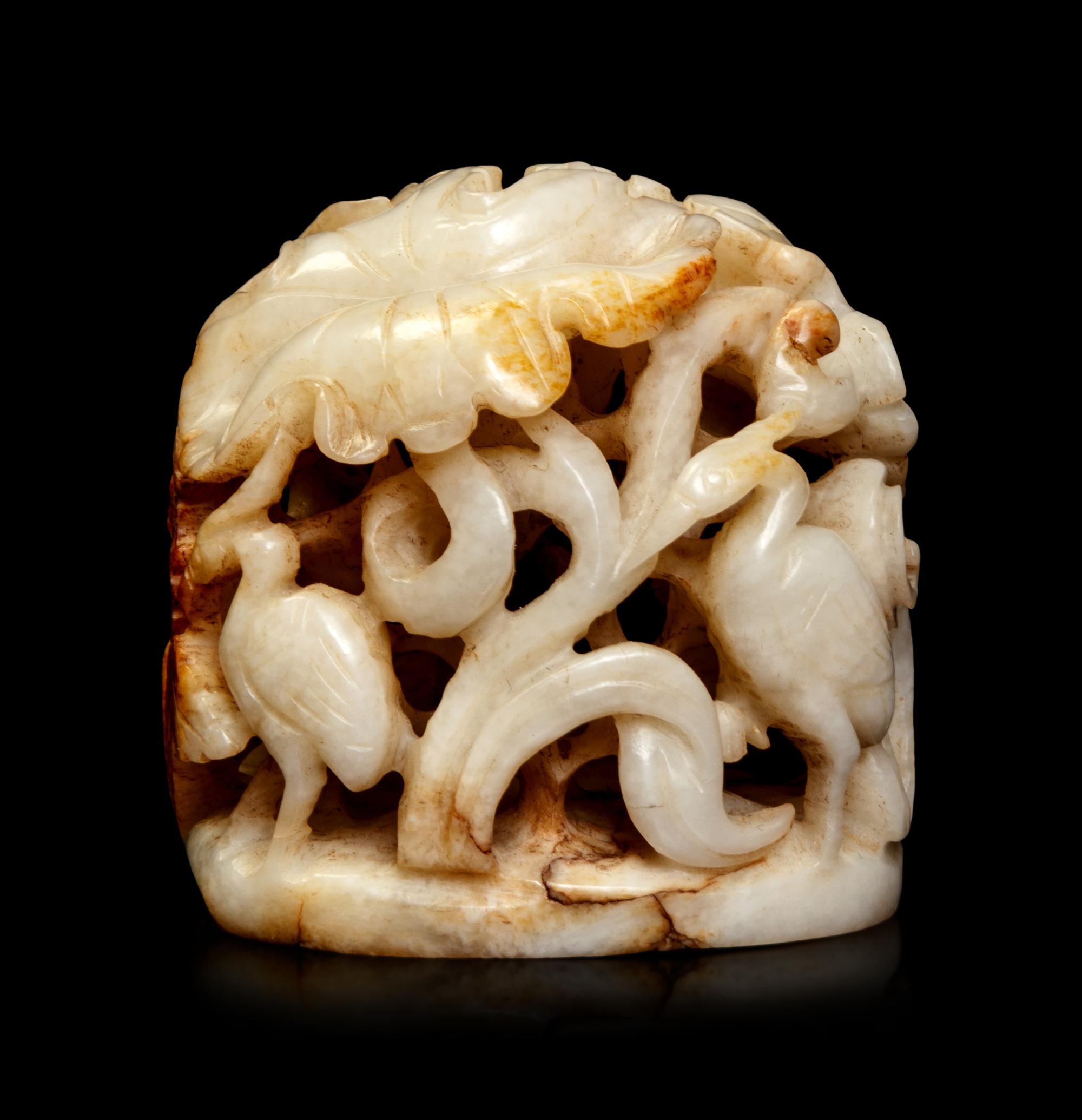 A White and Russet Jade Finial