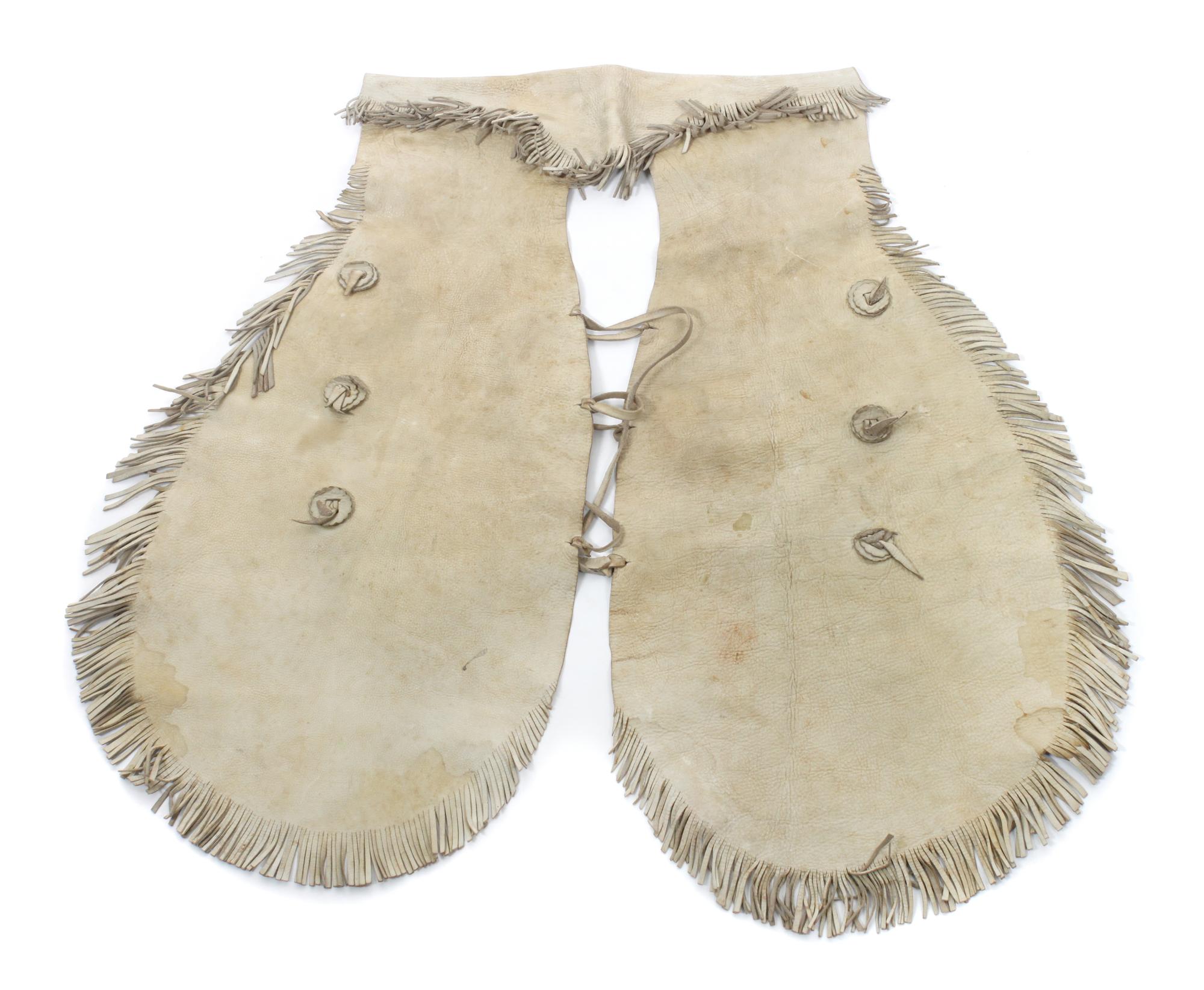Two Pairs of Children's Chaps and a pair of Gauntlets Length of chaps 30 inches.