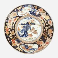 Three Massive Imari chargers The pair Meiji period, the third circa 1700-1725