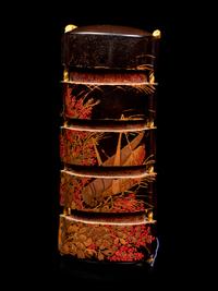 A Gold and Black Lacquer Four-Case Inro