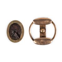 [LINCOLN ASSASSINATION]. A cuff button worn by President Abraham Lincoln on the night of his assassination at Ford's Theatre, 14 April 1865.
