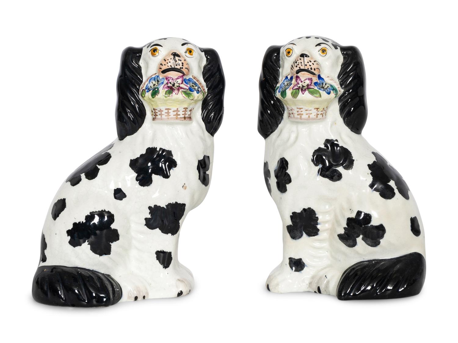 A Pair of Staffordshire Pottery Disraeli Spaniels with Floral Baskets