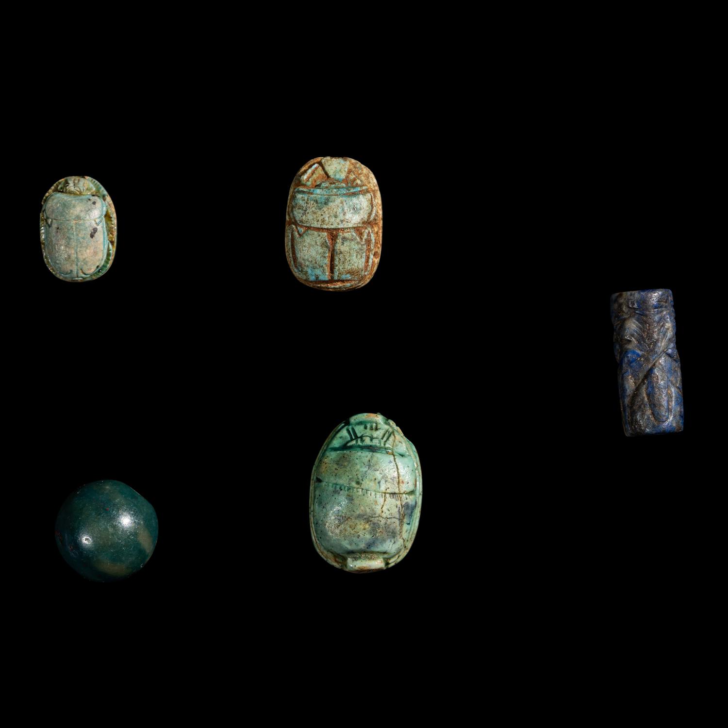 A Group of 3 Egyptian Faience Scarabs and 2 Near Eastern Stone Seals