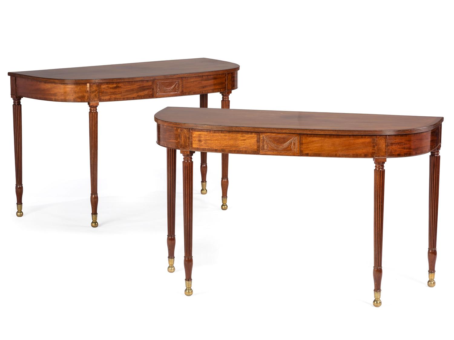 A Pair of Federal Brass-Mounted, Carved and Crossbanded Mahogany Console Tables
