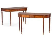 A Pair of Federal Brass-Mounted, Carved and Crossbanded Mahogany Console Tables
