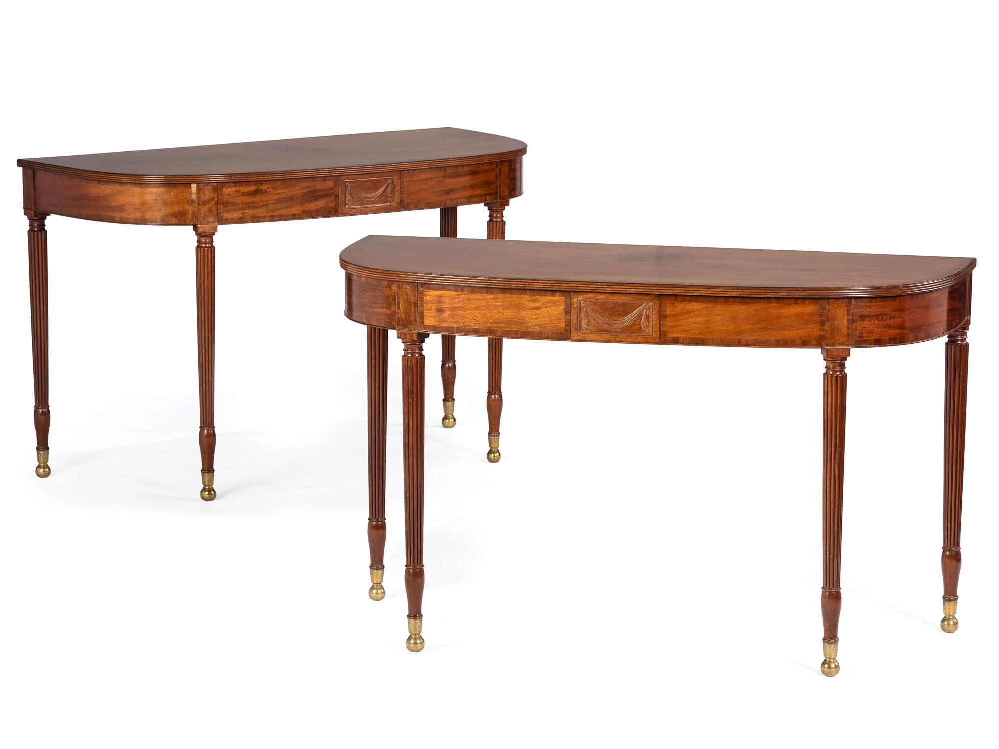 A Pair of Federal Brass-Mounted, Carved and Crossbanded Mahogany Console Tables
