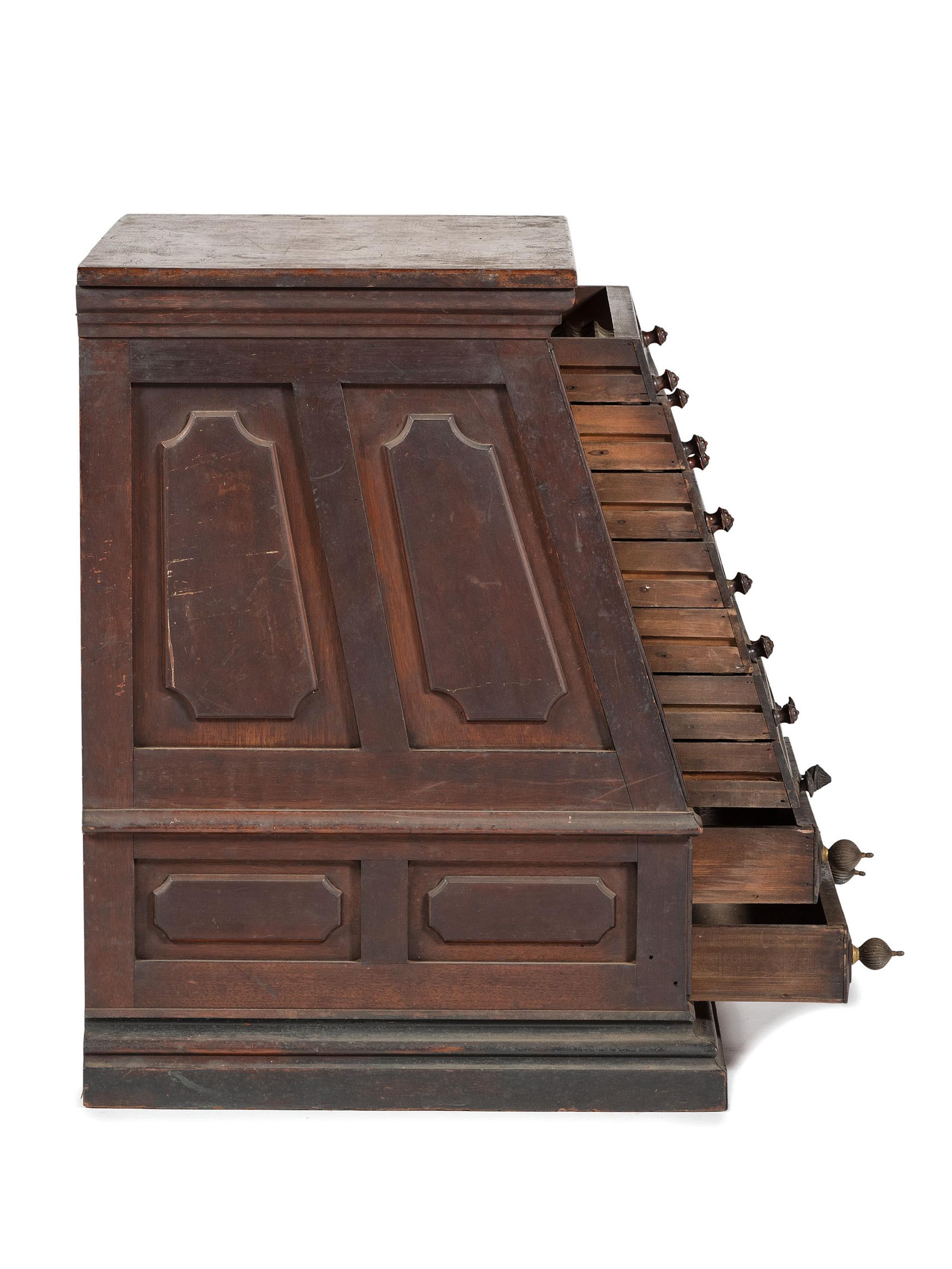 A Nine Drawer Counter Top Spool Cabinet