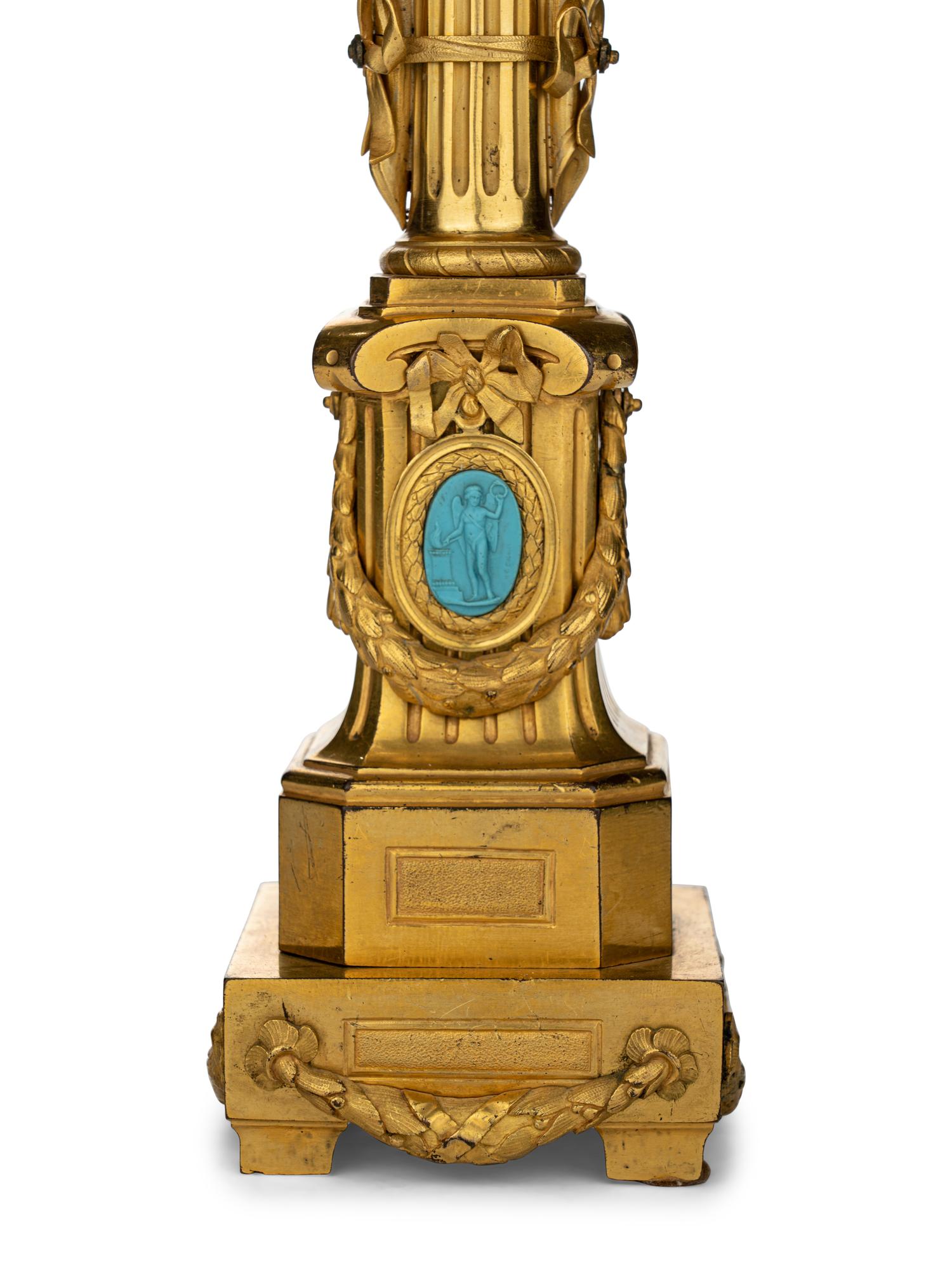 A Pair of Louis XVI Gilt Bronze Two-Light Lamps